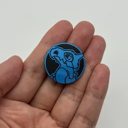In hand, from Pokémon Coin Fan, full size