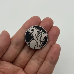 In hand, from Pokémon Coin Fan, full size