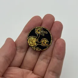 In hand, from Pokémon Coin Fan, full size