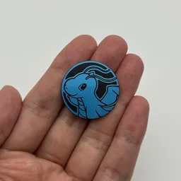 In hand, from Pokémon Coin Fan, full size