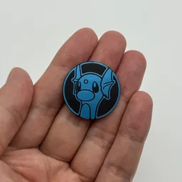 In hand, from Pokémon Coin Fan, full size