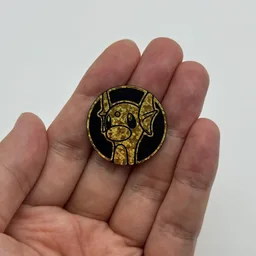 In hand, from Pokémon Coin Fan, full size