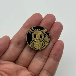 In hand, from Pokémon Coin Fan, full size