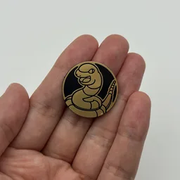 In hand, from Pokémon Coin Fan, full size