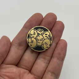 In hand, from Pokémon Coin Fan, full size
