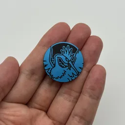 In hand, from Pokémon Coin Fan, full size