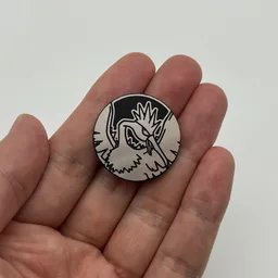 In hand, from Pokémon Coin Fan, full size