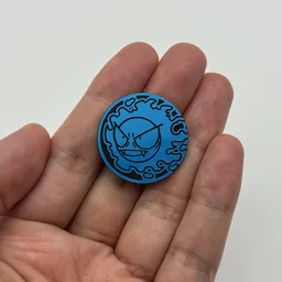 In hand, from Pokémon Coin Fan, full size