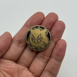 In hand, from Pokémon Coin Fan, full size