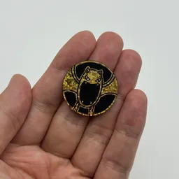 In hand, from Pokémon Coin Fan, full size