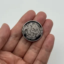 In hand, from Pokémon Coin Fan, full size