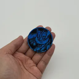 In hand, from Pokémon Coin Fan, full size