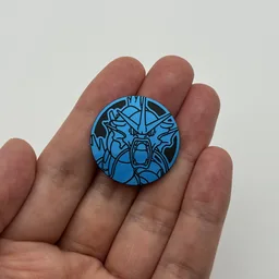 In hand, from Pokémon Coin Fan, full size