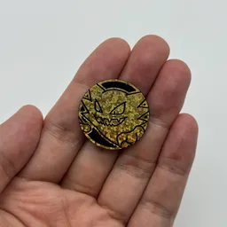 In hand, from Pokémon Coin Fan, full size