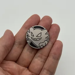 In hand, from Pokémon Coin Fan, full size