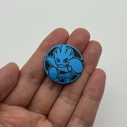 In hand, from Pokémon Coin Fan, full size