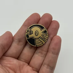 In hand, from Pokémon Coin Fan, full size
