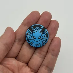In hand, from Pokémon Coin Fan, full size