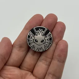 In hand, from Pokémon Coin Fan, full size