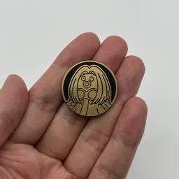 In hand, from Pokémon Coin Fan, full size