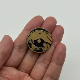 In hand, from Pokémon Coin Fan, full size