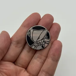 In hand, from Pokémon Coin Fan, full size