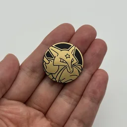 In hand, from Pokémon Coin Fan, full size
