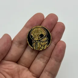 In hand, from Pokémon Coin Fan, full size