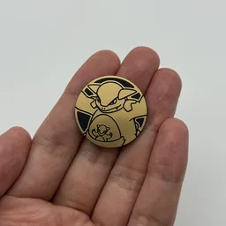 In hand, from Pokémon Coin Fan, full size