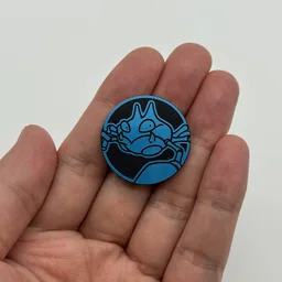 In hand, from Pokémon Coin Fan, full size
