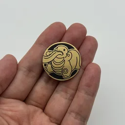 In hand, from Pokémon Coin Fan, full size