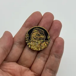 In hand, from Pokémon Coin Fan, full size