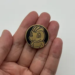 In hand, from Pokémon Coin Fan, full size
