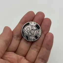 In hand, from Pokémon Coin Fan, full size