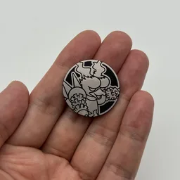 In hand, from Pokémon Coin Fan, full size