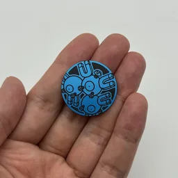 In hand, from Pokémon Coin Fan, full size
