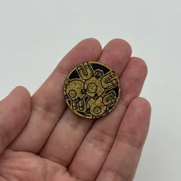 In hand, from Pokémon Coin Fan, full size
