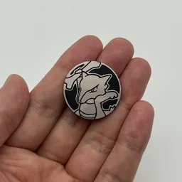 In hand, from Pokémon Coin Fan, full size