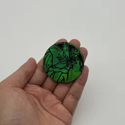 In hand, from Pokémon Coin Fan, full size