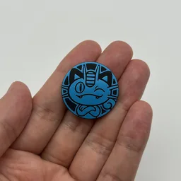 In hand, from Pokémon Coin Fan, full size