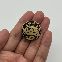 In hand, from Pokémon Coin Fan, full size