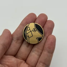 In hand, from Pokémon Coin Fan, full size