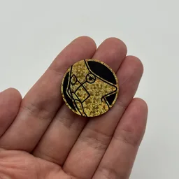 In hand, from Pokémon Coin Fan, full size