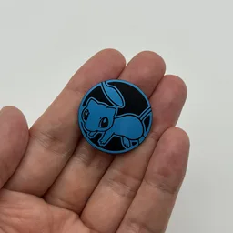 In hand, from Pokémon Coin Fan, full size
