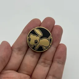 In hand, from Pokémon Coin Fan, full size