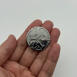 In hand, from Pokémon Coin Fan, full size