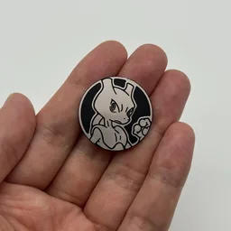 In hand, from Pokémon Coin Fan, full size