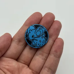 In hand, from Pokémon Coin Fan, full size