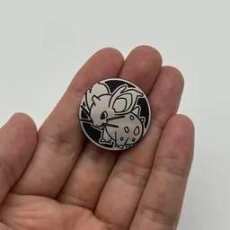 In hand, from Pokémon Coin Fan, full size