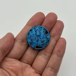 In hand, from Pokémon Coin Fan, full size